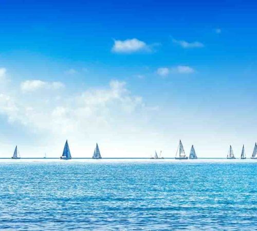 Sailing boat yacht regatta race on sea or ocean water